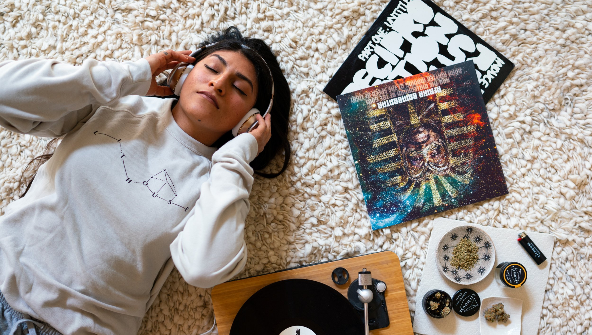 A girl sleeping and enjoying music